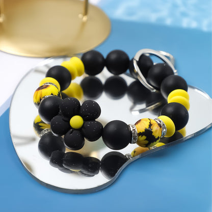 Retro Daisy Silicone Bead Bracelet Keychain with Floral Accent